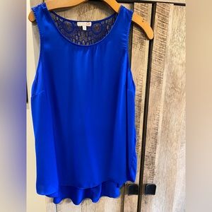 GBX lace back asymmetrical tank, size large.